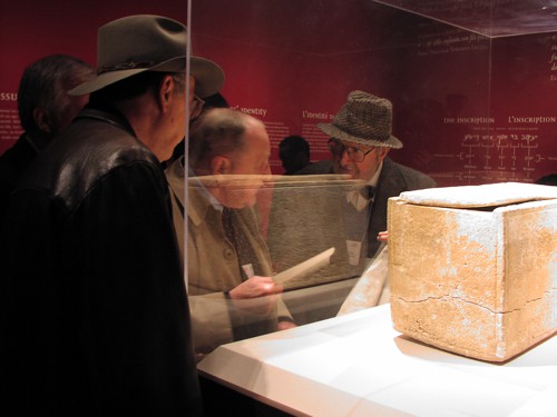 My favorite picture of Prof. Frank Moore Cross with his ever-present hat, intently discussing the James ossuary in Toronto in 2002 with Hershel Shanks and Joe Fitzmyer as we all crowd around to listen in. Thanks to Lori Woodall for this lovely photo.